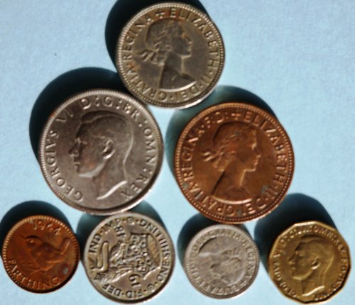 Set od sedam rijetkih kolekcionarskih kovanica iz Ujedinjenog Kraljevstva / Velike Britanije - 1942. Threepecence, 1948. jedan šiling;
